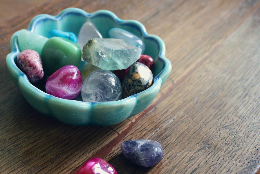 Assorted lucky stones and crystals, each associated with unique energies and believed to bring good fortune and positive vibes.